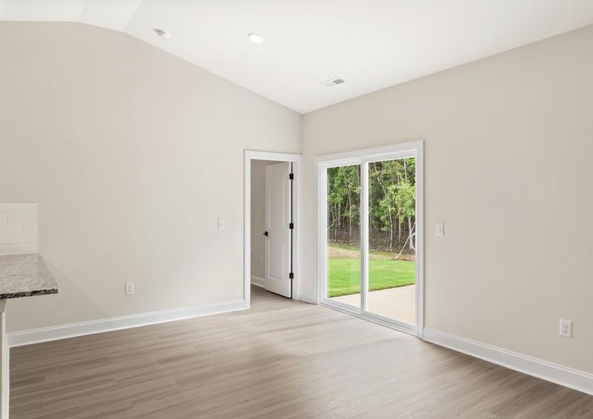 The living room opens up to the kitchen.