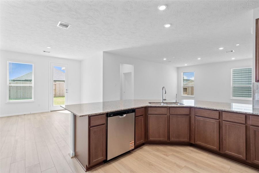 This stunning kitchen is perfect for everyday life as well as entertaining family and friends! The spacious granite countertop is perfect for conversation or that much needed space to lay out your party spread for everyone to enjoy! This stunning kitchen is perfect for everyday life as well as entertaining family and friends! The spacious granite countertop is perfect for conversation or that much needed space to lay out your party spread for everyone to enjoy!