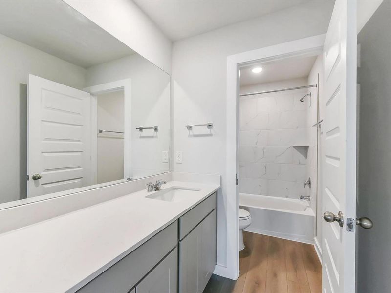 Furnished interior view inside a new home in Windmill Estates, Magnolia (Image 36).