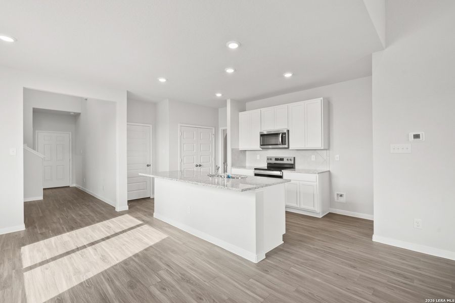 Furnished interior view inside a new home in Abbott Place, St. Hedwig (Image 12).