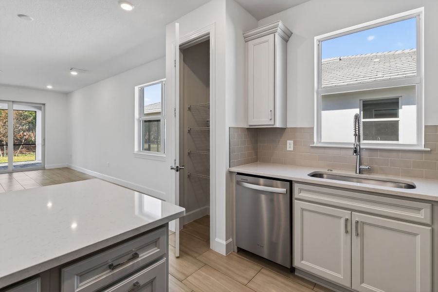 Furnished interior view inside a new home in Costa Pointe, Vero Beach (Image 19).