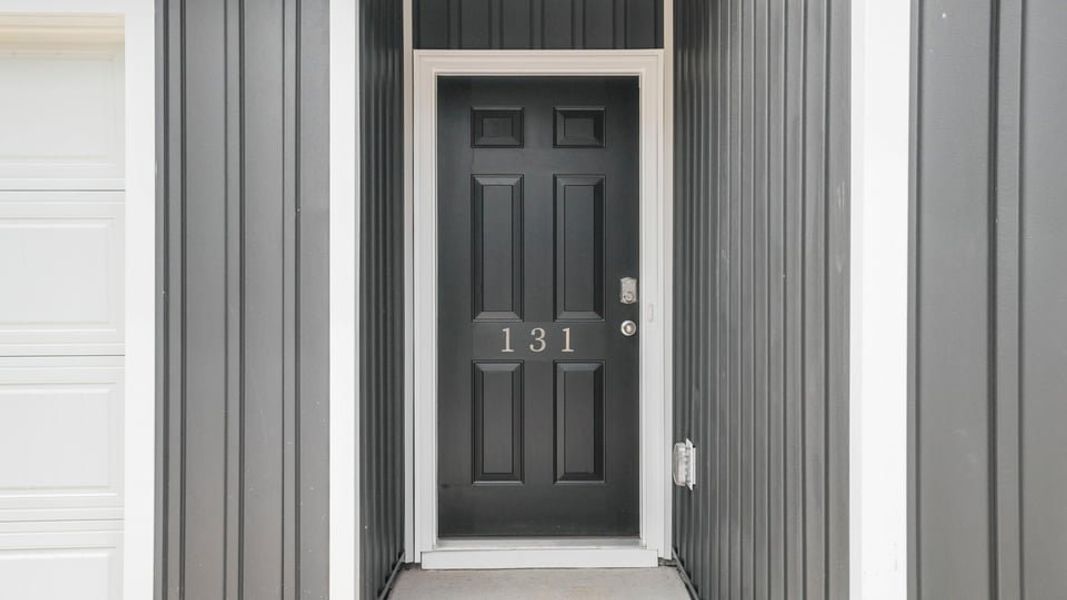Exterior details and patio area of a home in Tyger Pines, Moore (Image 4).