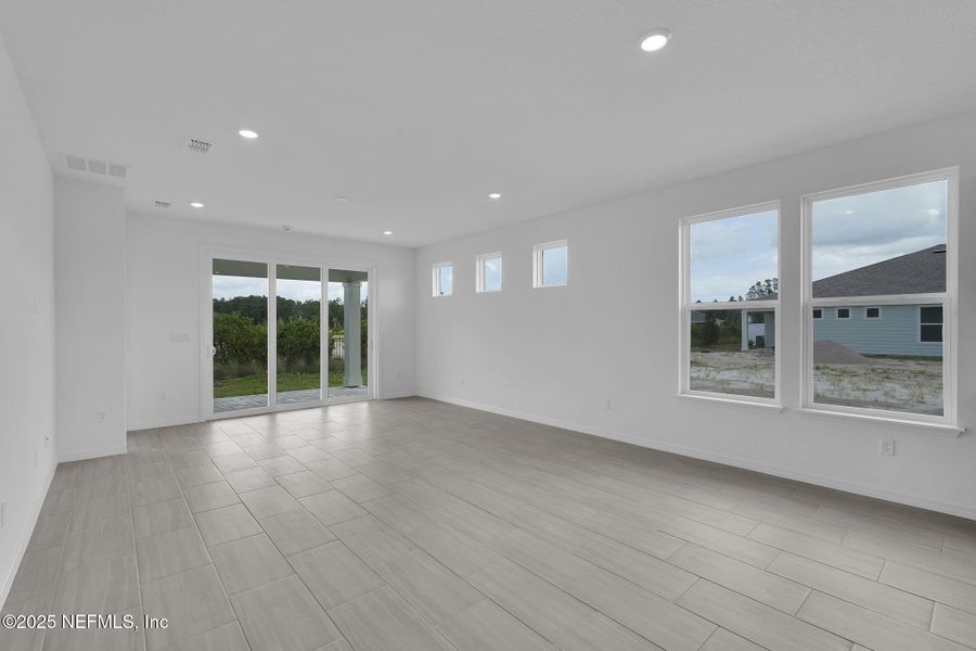 Spacious, unfurnished interior of a new home in Del Webb Wildlight, Yulee (Image 32).