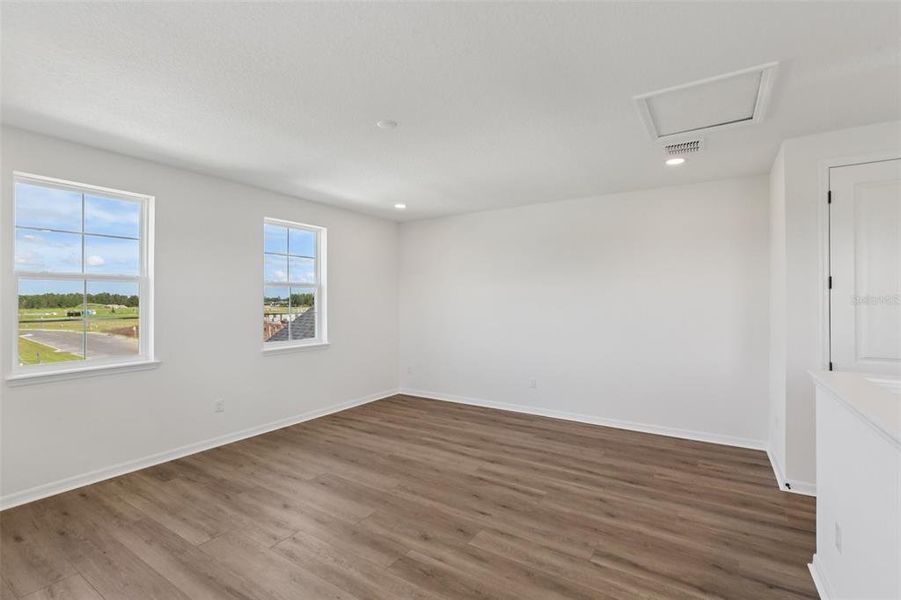Spacious, unfurnished interior of a new home in Primrose at Longleaf, New Port Richey (Image 35).