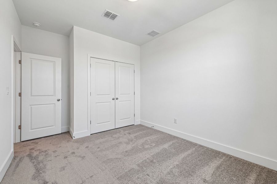 Spacious, unfurnished interior of a new home in Freedom at Anthem, Kyle (Image 24).