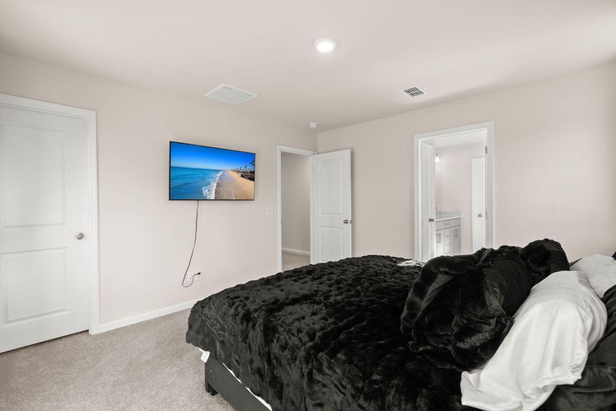 Furnished interior view inside a new home in Jasmine Point at Lakes of Cane Bay, Summerville (Image 28).