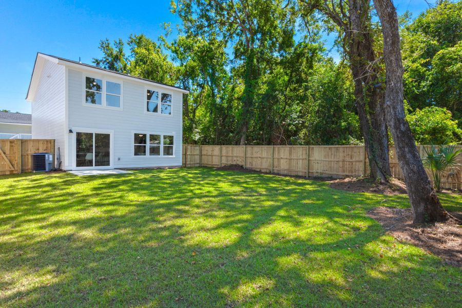 Front exterior of a new home in , Charleston, SC, highlighting curb appeal (Image 1).