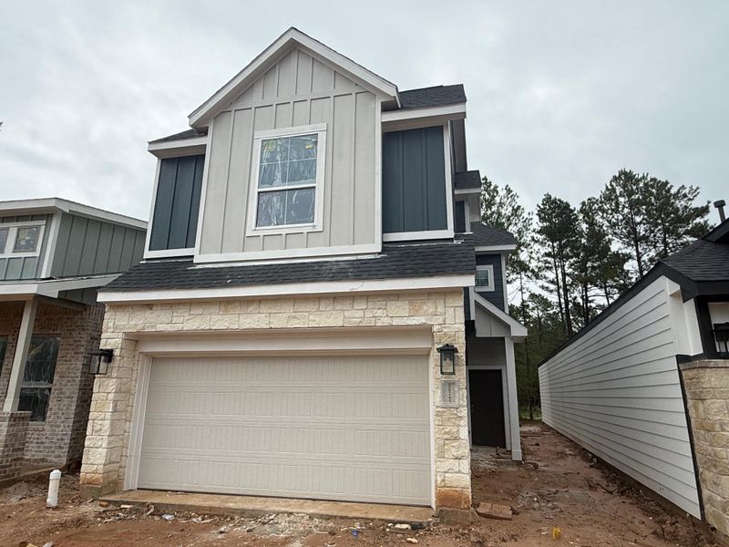 Front exterior of a new home in Kresston, Montgomery, TX, highlighting curb appeal (Image 2). Front exterior of a new home in Kresston, Montgomery, TX, highlighting curb appeal (Image 2).