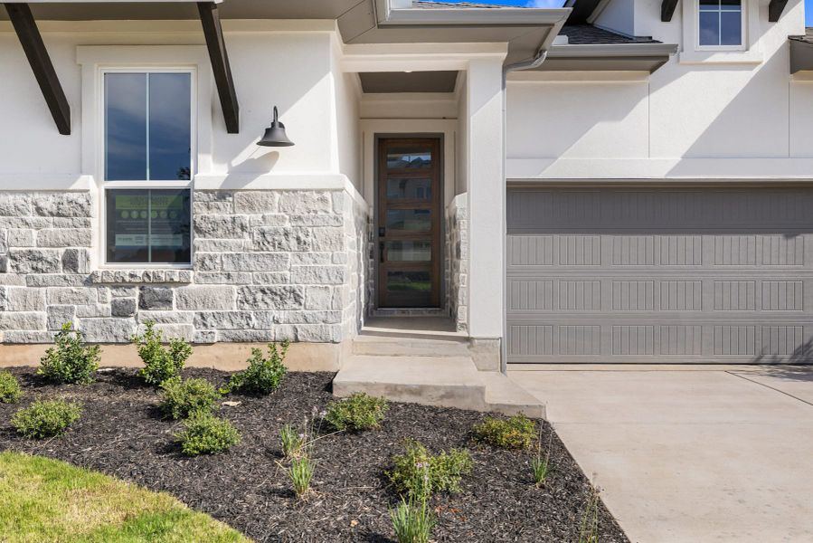 Exterior details and patio area of a home in Wolf Ranch, Georgetown (Image 3).