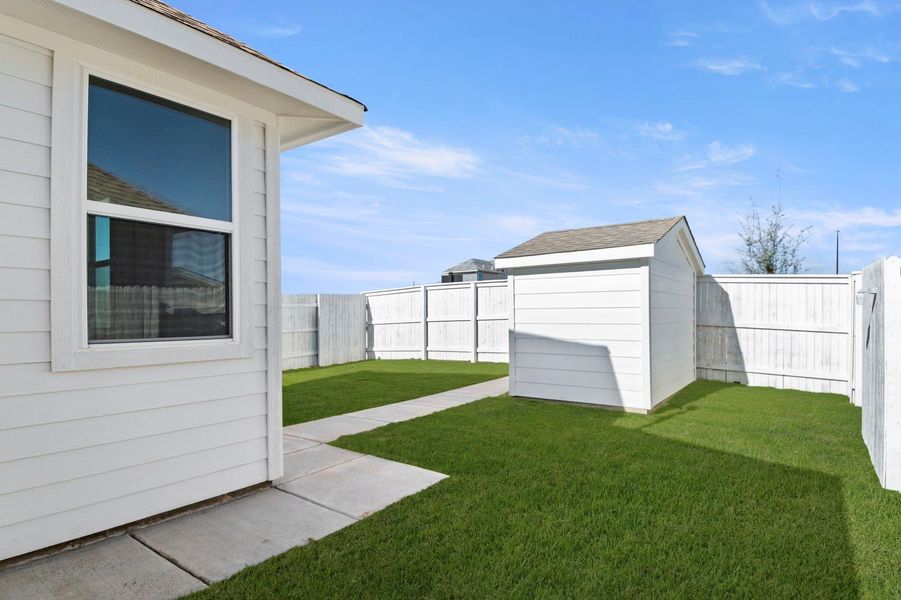 Exterior details and patio area of a home in Harvest Ridge, Elgin (Image 3).
