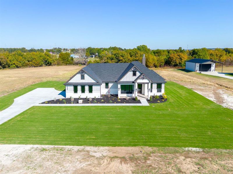 Front exterior of a new home in , Weatherford, TX, highlighting curb appeal (Image 19).