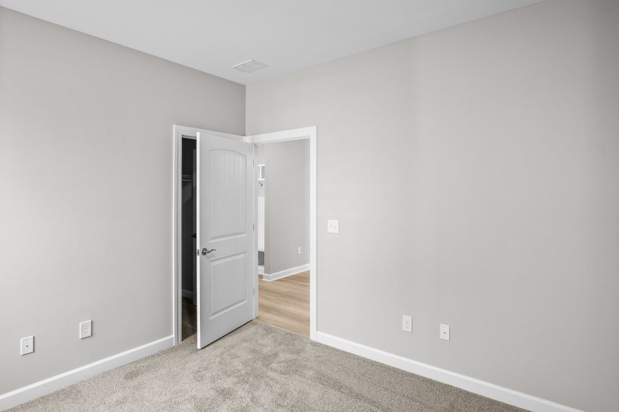 Spacious, unfurnished interior of a new home in Traditions at Carolina Forest, Myrtle Beach (Image 14). Spacious, unfurnished interior of a new home in Traditions at Carolina Forest, Myrtle Beach (Image 14).