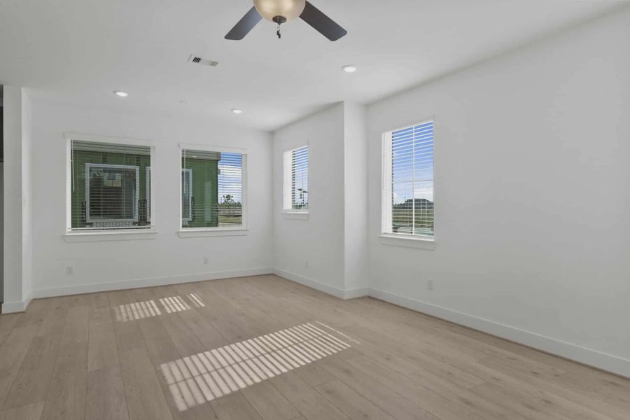 Representative unfurnished interior of a home built from the Riverdale by Chesmar Homes in Meridiana Courtyard Collection, Manvel (Image 18).