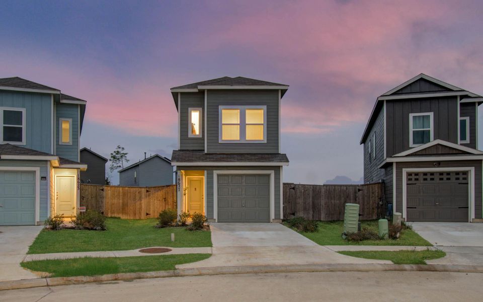 Front exterior of a new home in , New Caney, TX, highlighting curb appeal (Image 21). Front exterior of a new home in , New Caney, TX, highlighting curb appeal (Image 21).