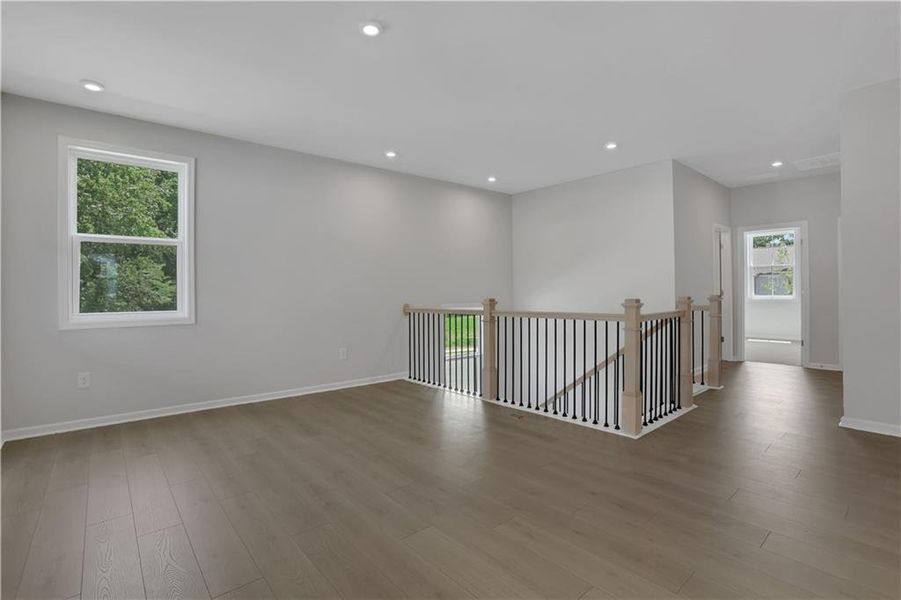 Spacious, unfurnished interior of a new home in The Paddocks at Doc Hughes, Buford (Image 36).