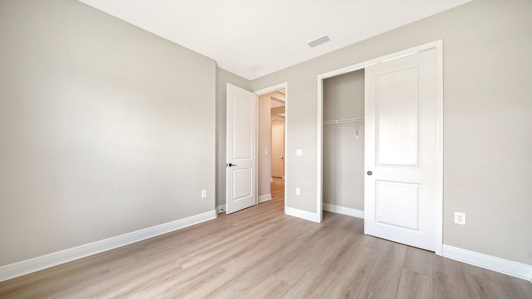 Spacious, unfurnished interior of a new home in Windward Real Estate and Homes for Sale in Sarasota, FL - Neal Communities, Lakewood Ranch (Image 47).