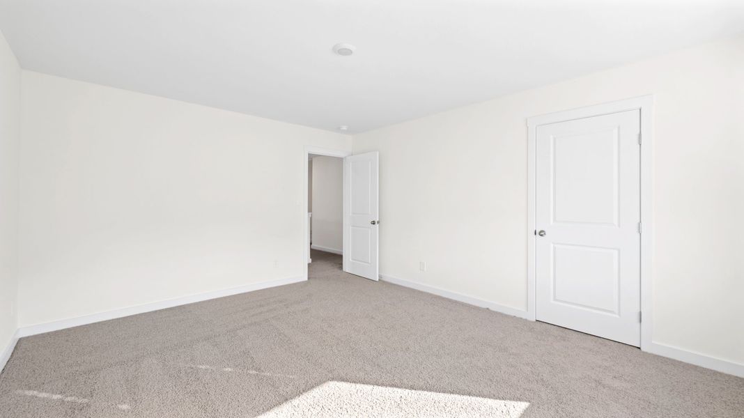 Representative unfurnished interior of a home built from the Salem by D.R. Horton in Hawks Landing, Apison (Image 26).
