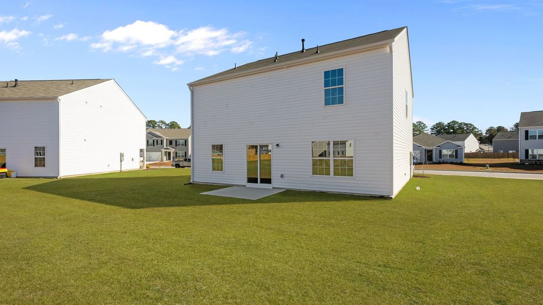 Exterior details and patio area of a home in Madeline Farm, New Bern (Image 16).