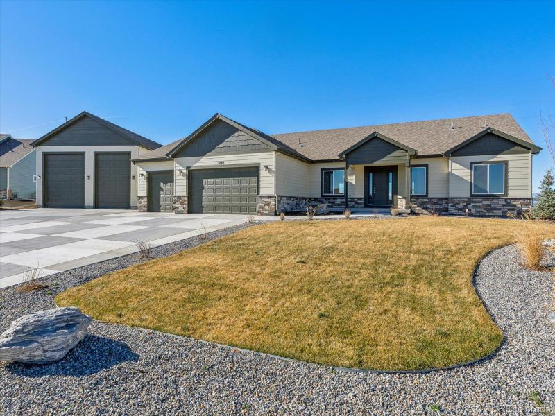 Front exterior of a new home in , Dacono, CO, highlighting curb appeal (Image 19).