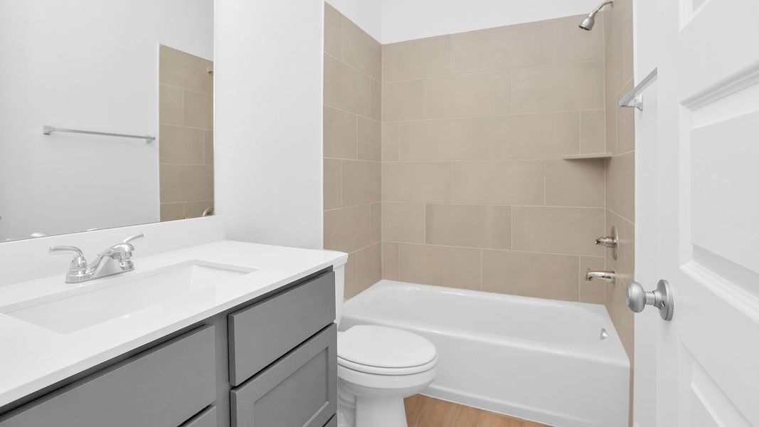 Furnished interior view inside a new home in Artavia 45', Conroe (Image 9).