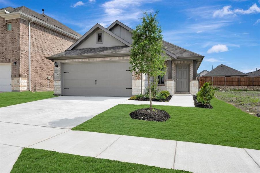 Front exterior of a new home in Elevon, Lavon, TX, highlighting curb appeal (Image 23). Front exterior of a new home in Elevon, Lavon, TX, highlighting curb appeal (Image 23).