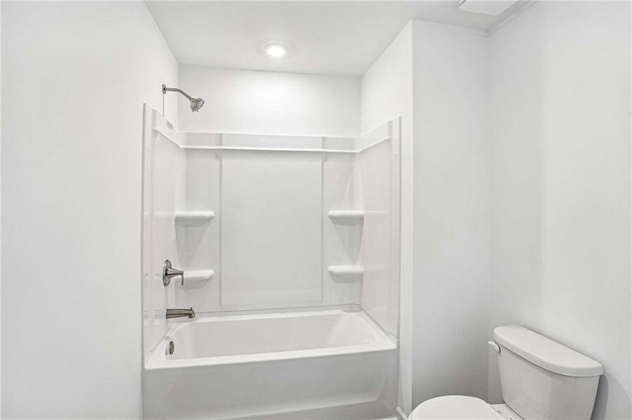 Furnished interior view inside a new home in Eastlyn Crossing, Flowery Branch (Image 8).