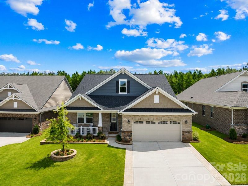 Front exterior of a new home in Sonata at Mint Hill, Mint Hill, NC, highlighting curb appeal (Image 22).