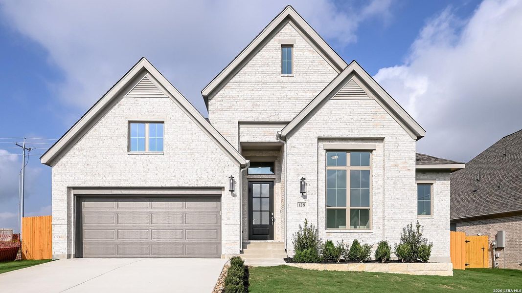 Front exterior of a new home in Cibolo Valley Heights, Cibolo, TX, highlighting curb appeal (Image 22). Front exterior of a new home in Cibolo Valley Heights, Cibolo, TX, highlighting curb appeal (Image 22).