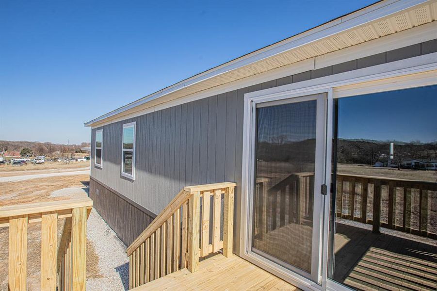 Exterior details and patio area of a home in , Springtown (Image 16).