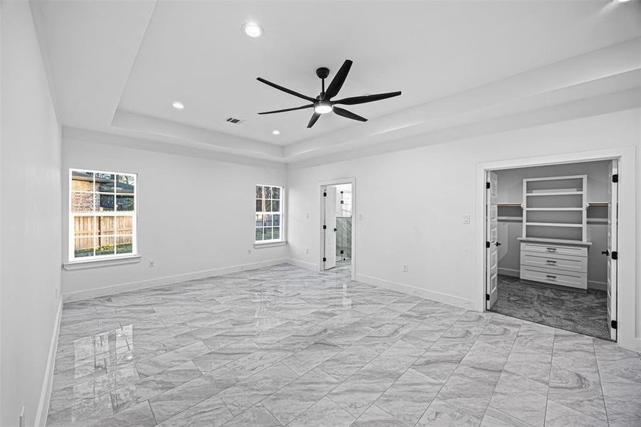 Primary Bedroom with oversized closet and fireplace