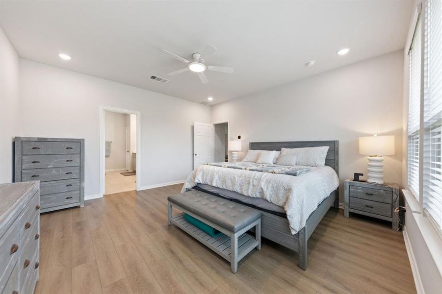 Furnished interior view inside a new home in Valencia On The Lake, Little Elm (Image 15). Furnished interior view inside a new home in Valencia On The Lake, Little Elm (Image 15).
