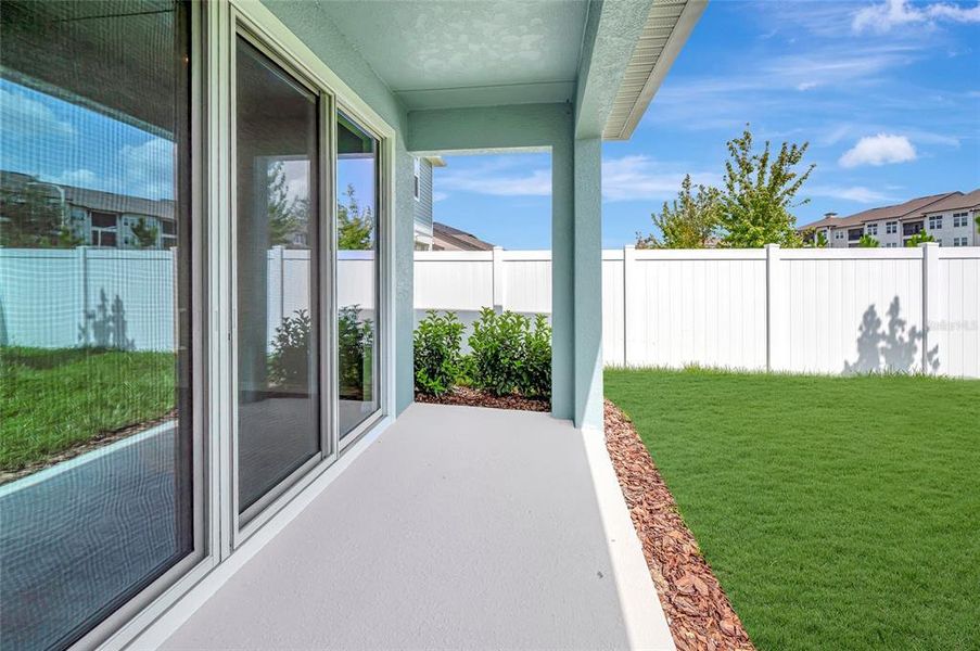 Exterior details and patio area of a home in Chapel Crossings - Garden Series, Wesley Chapel (Image 11). Exterior details and patio area of a home in Chapel Crossings - Garden Series, Wesley Chapel (Image 11).