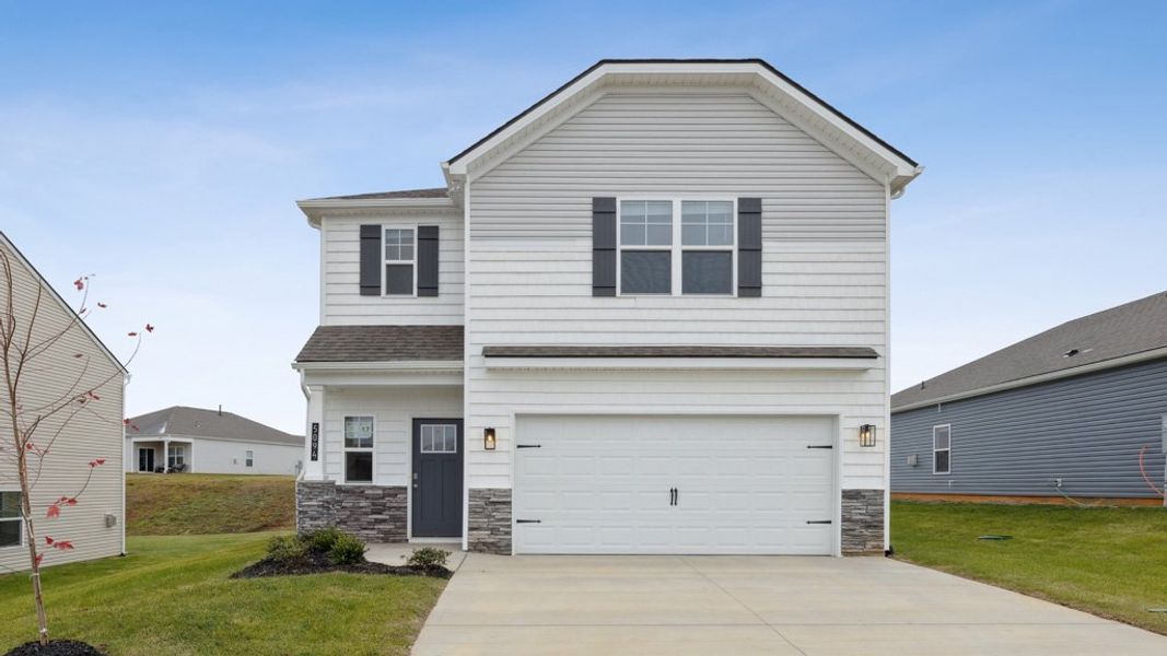 Front exterior of a new home in Millstone Village, Morristown, TN, highlighting curb appeal (Image 1). Front exterior of a new home in Millstone Village, Morristown, TN, highlighting curb appeal (Image 1).