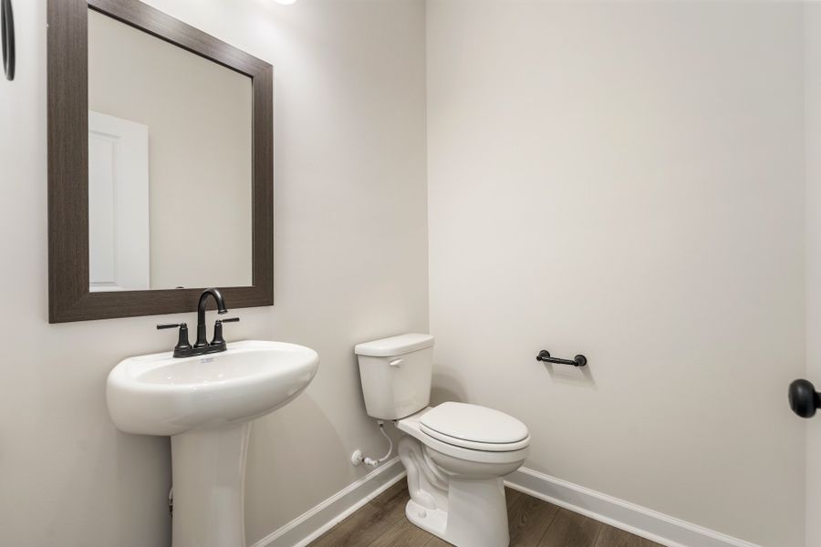 Furnished interior view inside a new home in Landing at Pine Lake, Anderson (Image 10).