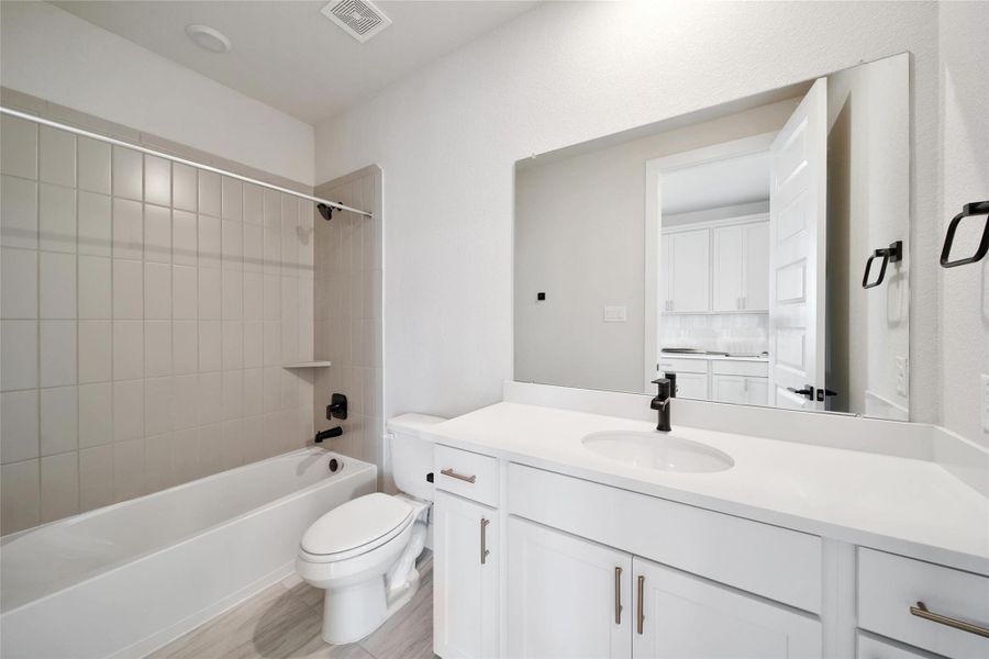 Furnished interior view inside a new home in Lago Pointe, Seabrook (Image 12).
