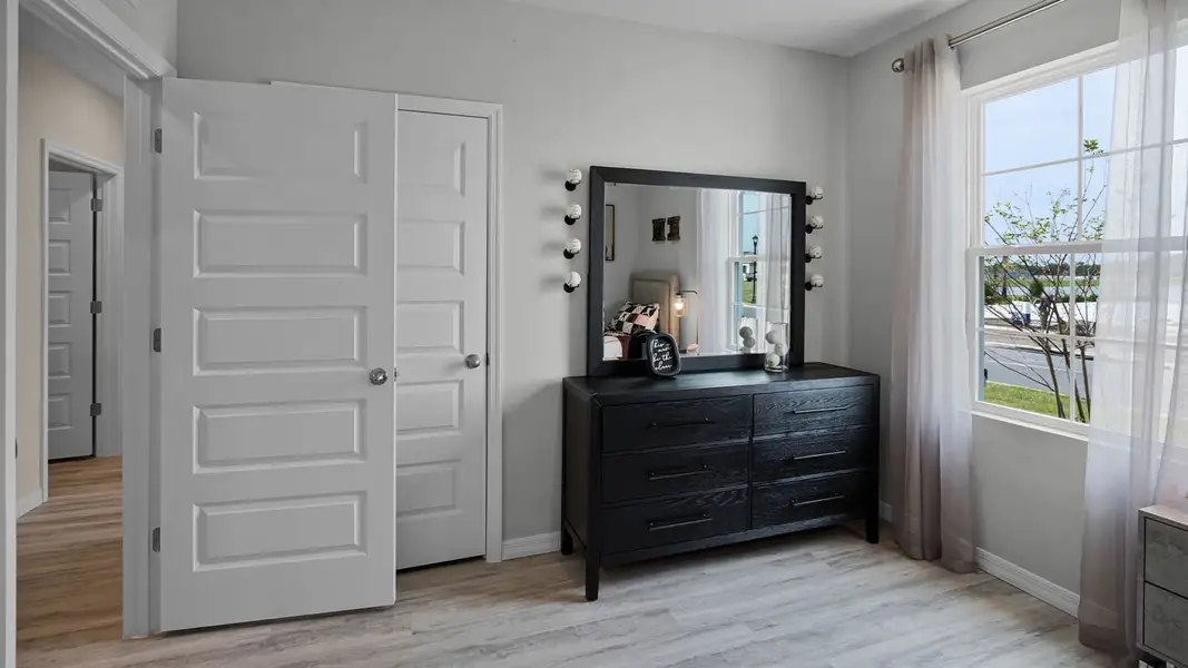 Furnished interior view inside a new home in Harmony at Lake Eloise, Winter Haven (Image 26).