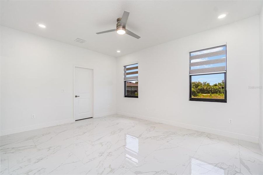 Spacious, unfurnished interior of a new home in , Port Charlotte (Image 17).