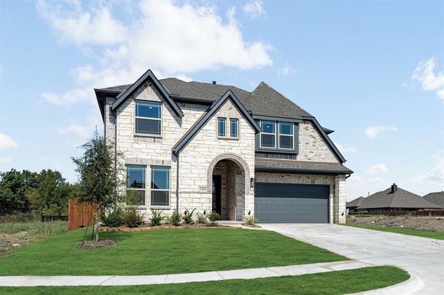 Front exterior of a new home in Ridge Ranch Classic 50, Mesquite, TX, highlighting curb appeal (Image 2). Front exterior of a new home in Ridge Ranch Classic 50, Mesquite, TX, highlighting curb appeal (Image 2).
