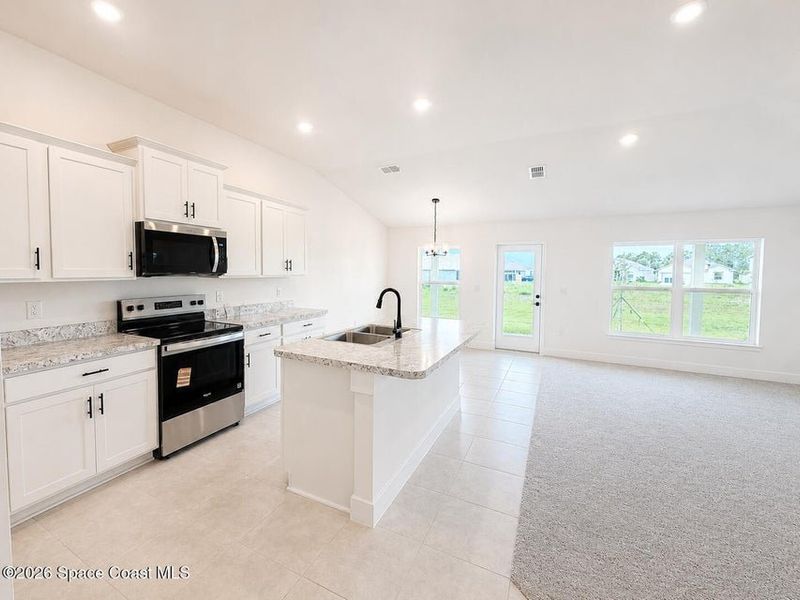 Furnished interior view inside a new home in St. John's Preserve, Palm Bay (Image 5).