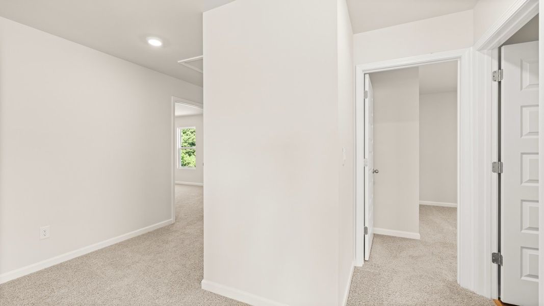 Representative unfurnished interior of a home built from the Elle by D.R. Horton in Preserve at Dove Creek, Statham (Image 23).