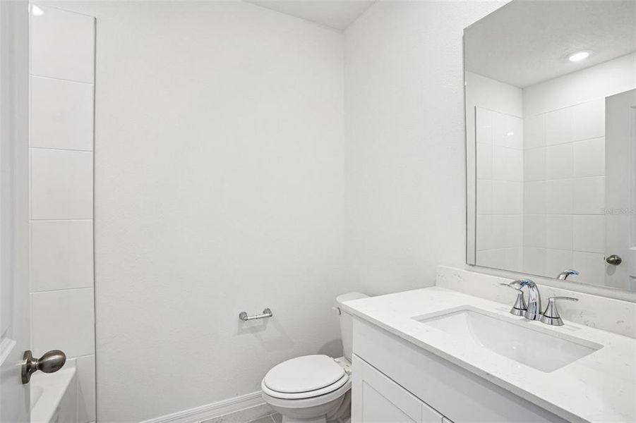 Furnished interior view inside a new home in Ridgehaven - Villas, Ormond Beach (Image 7).