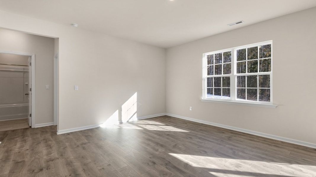 Spacious, unfurnished interior of a new home in The Reserve at Stoney Creek, Whitsett (Image 16).