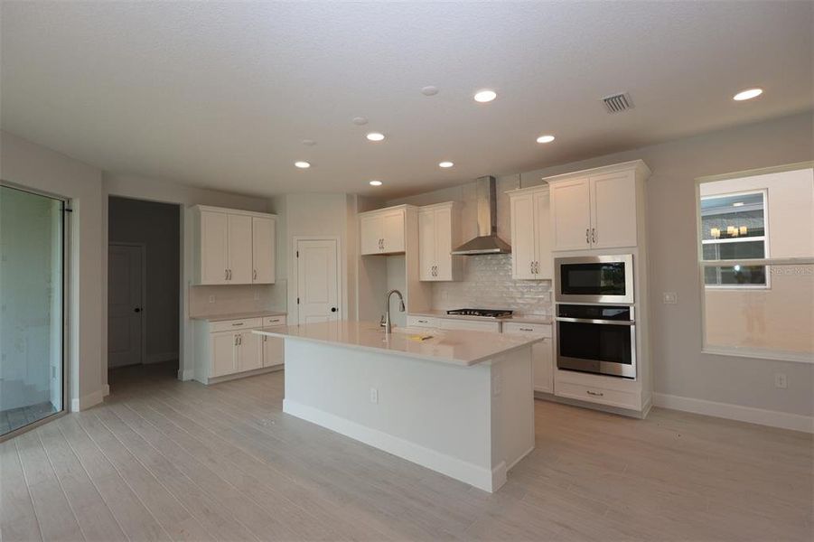 Furnished interior view inside a new home in Lake Star at Ovation, Winter Garden (Image 10).