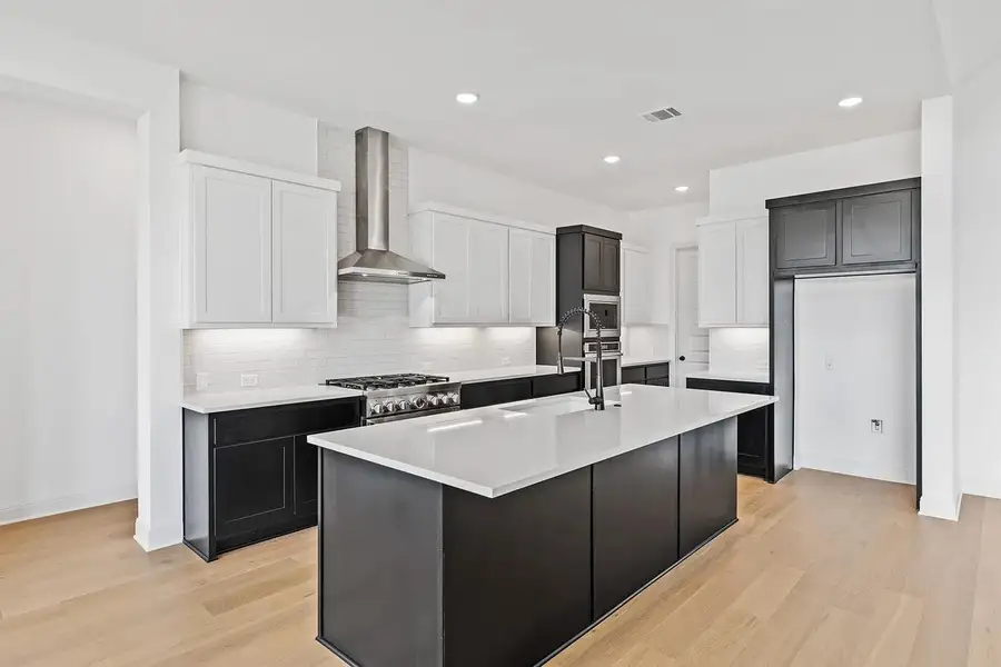 Furnished interior view inside a new home in Lariat - 70', Liberty Hill (Image 8).