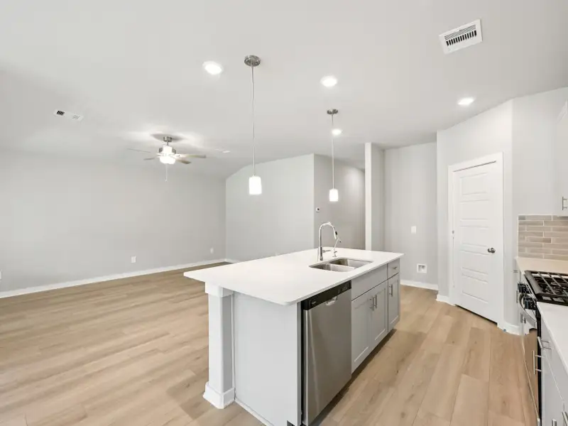 Furnished interior view inside a new home in Pine Lake Cove - Premier Series, Montgomery (Image 5).