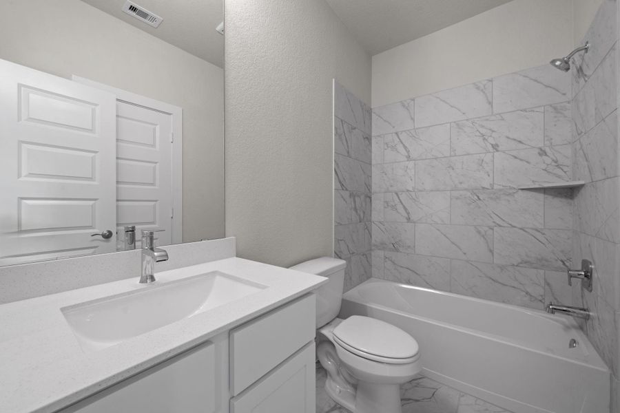 Furnished interior view inside a new home in Barton Creek Ranch, Conroe (Image 8).