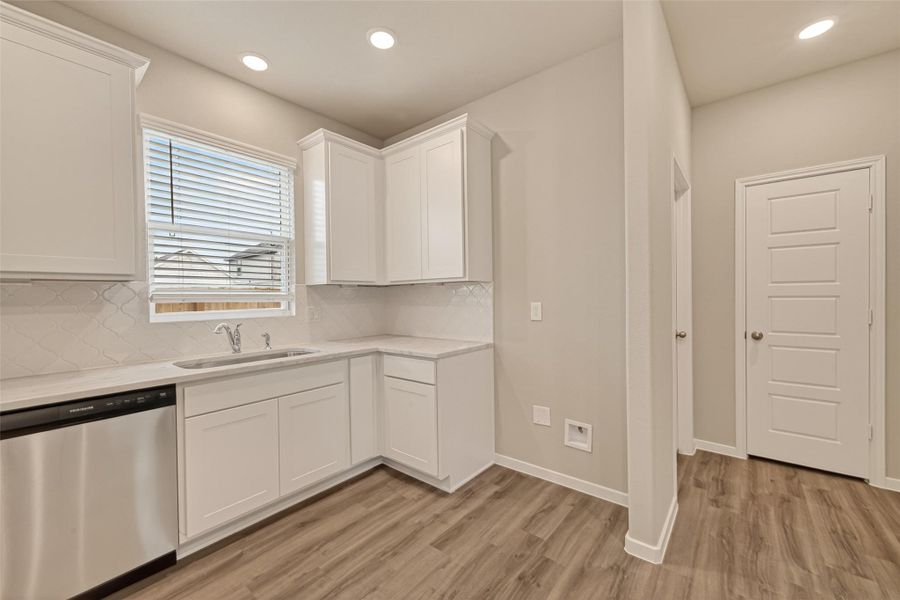 Furnished interior view inside a new home in Sunterra, Katy (Image 7).