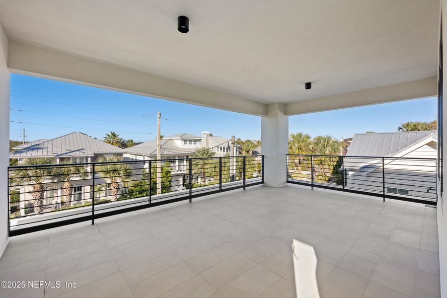 Exterior details and patio area of a home in , Atlantic Beach (Image 4).