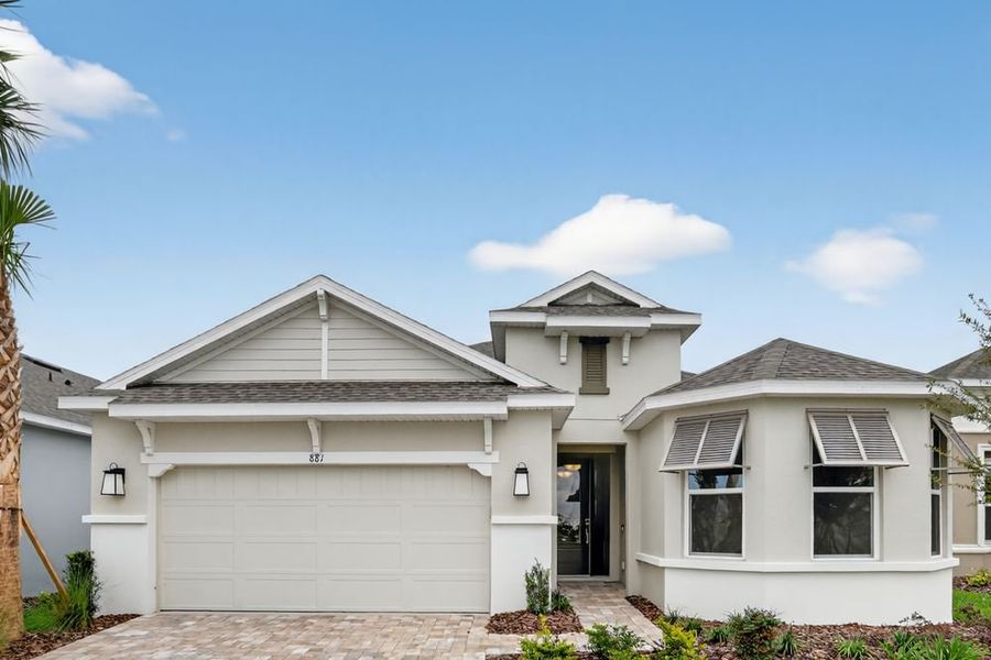 Front exterior of a new home in Center Lake Ranch Community Group Page, St. Cloud, FL, highlighting curb appeal (Image 1). Front exterior of a new home in Center Lake Ranch Community Group Page, St. Cloud, FL, highlighting curb appeal (Image 1).
