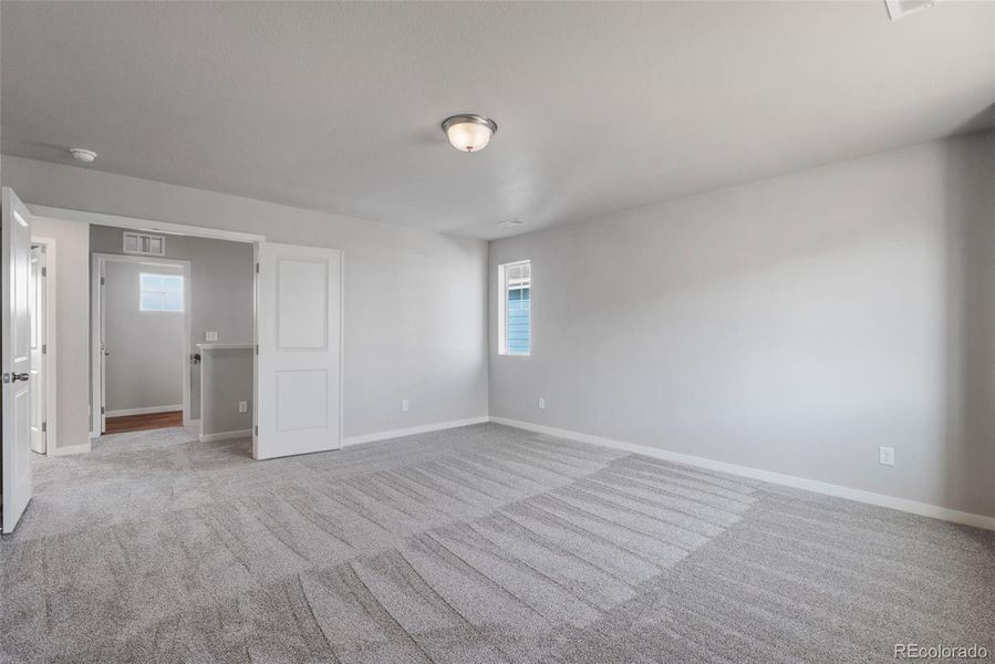 Spacious, unfurnished interior of a new home in Sky Ranch – Uptown Collection, Watkins (Image 26).